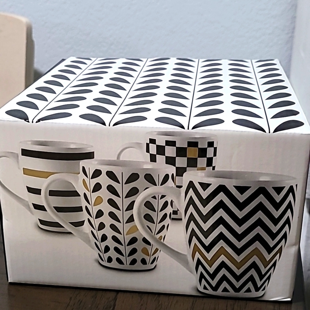 Set of four Macy's mugs. PAI